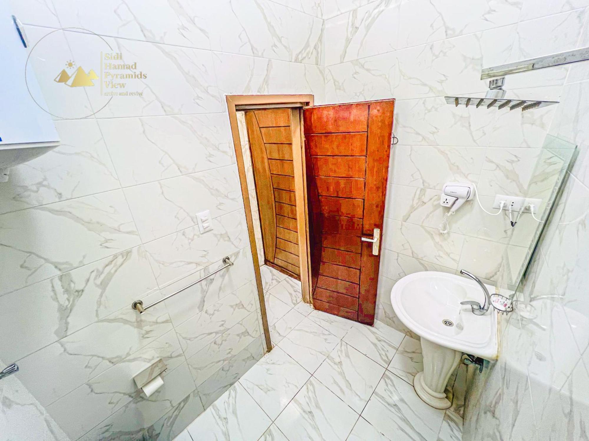 Sidi Hamad Pyramids View Hotel Kafrat al Jabal Exterior photo