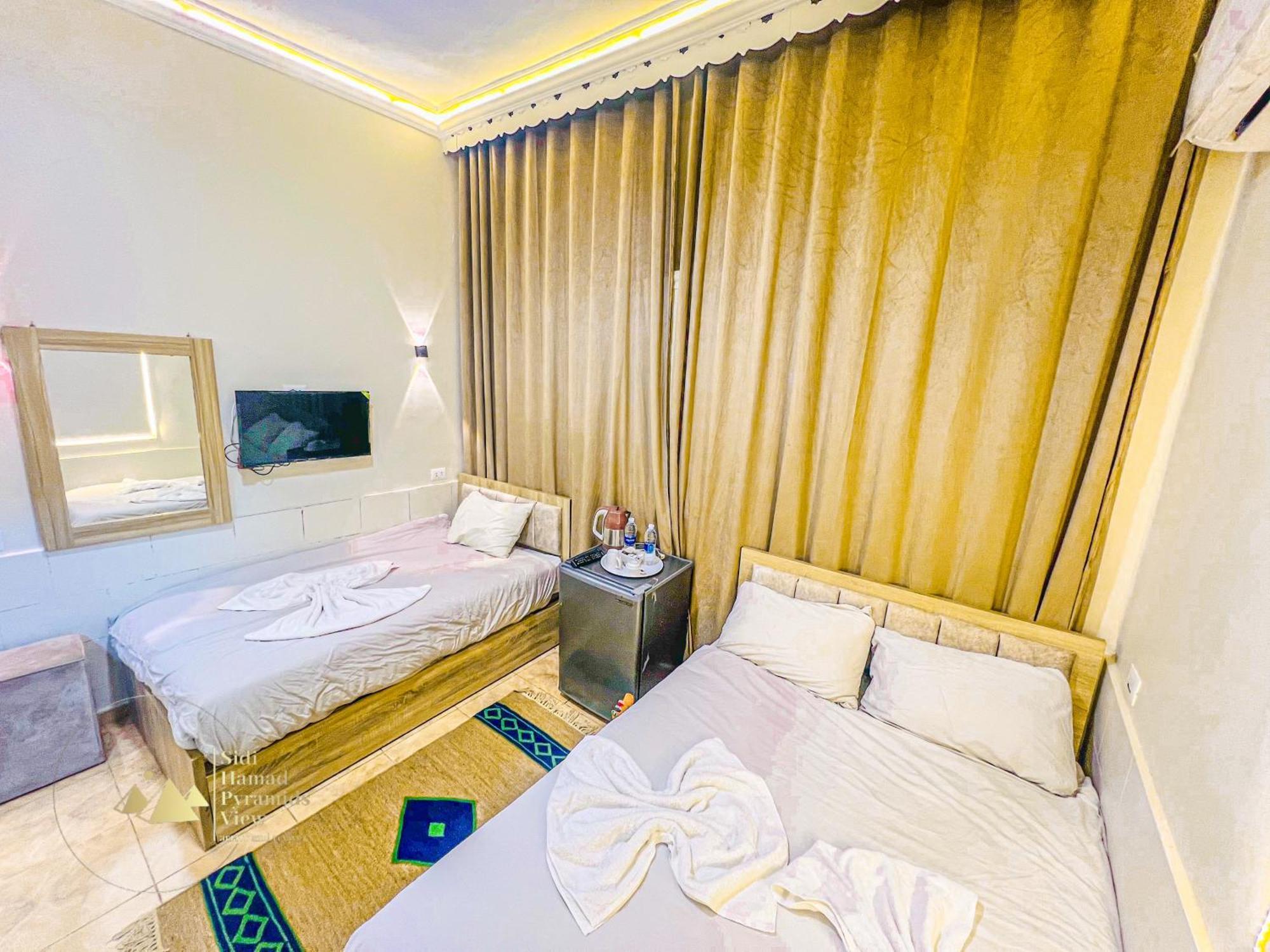 Sidi Hamad Pyramids View Hotel Kafrat al Jabal Exterior photo